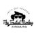 The Toasted Monkey logo