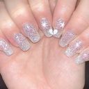 Belle J Nails & Spa logo